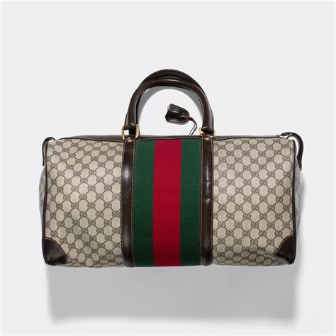 gucci keepall|Gucci econyl luggage.